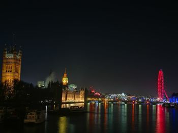 Illuminated city lit up at night