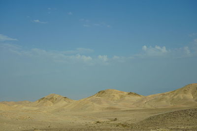 Scenic view of desert against sky