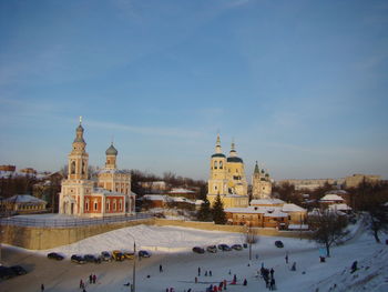 Group of people in front of building in winter