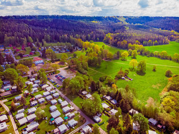 High angle view of trees on field against sky