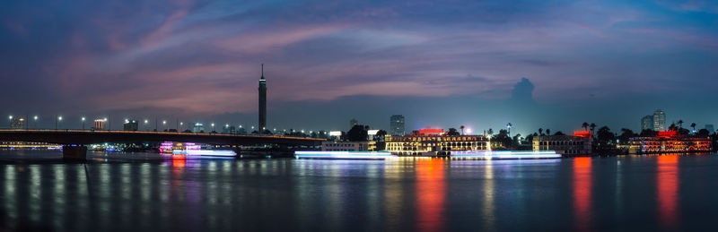 Illuminated buildings at waterfront