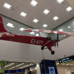 Low angle view of illuminated text on ceiling