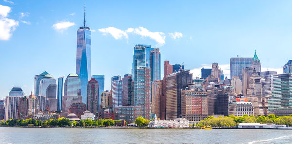 Modern buildings in city against sky