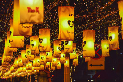 Illuminated lanterns hanging at night