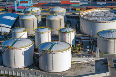 Big white oil tanks in the harbor of barcelona