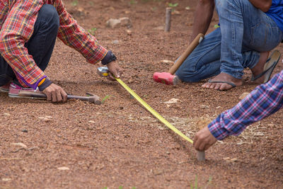 Low section of men working