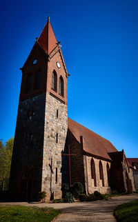 Low angle view of old building against sky