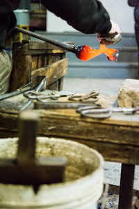 Man preparing vase in industry