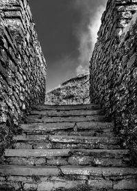 Low angle view of steps against sky