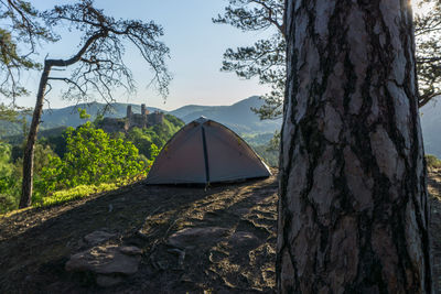 View of tent on mountain against sky