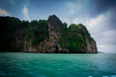 Scenic view of bay against sky