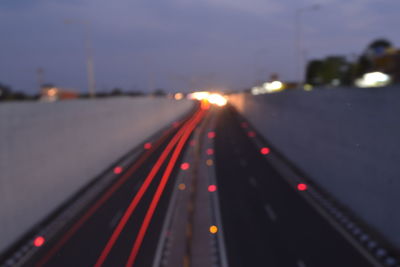 Close-up of illuminated road at night