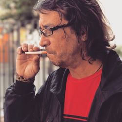 Close-up of man smoking cigarette