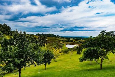 Scenic view of landscape against cloudy sky