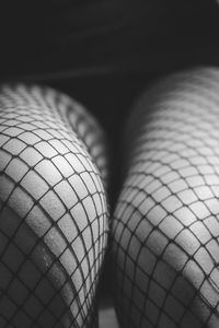 Low section of woman on tiled floor