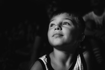 Portrait of cute boy looking away