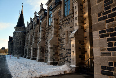 Buildings in city during winter