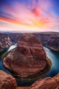 Scenic view of dramatic landscape during sunset