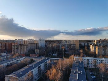 High angle view of buildings in city against sky