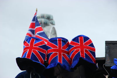 Close-up of flag against blue sky