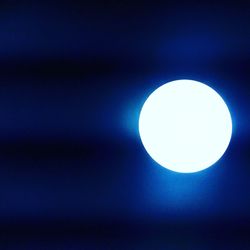 Close-up of moon against blue sky