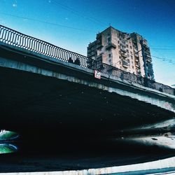 Low angle view of built structure against blue sky