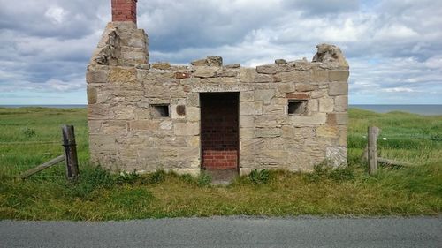 Old ruins against cloudy sky
