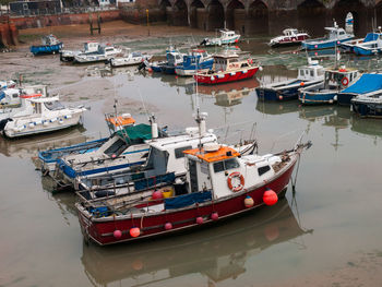 High angle view of boats moored in harbor