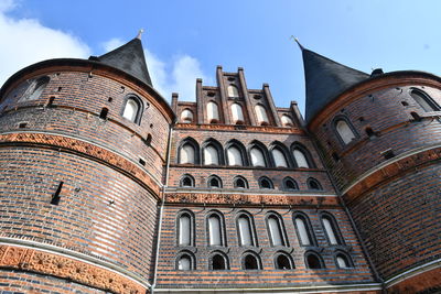 Low angle view of historical building against sky