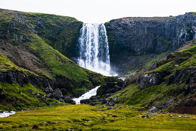 View of the svodufoss waterfall with basalt columns in the snaefellsnes peninsula in iceland