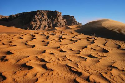 Scenic view of desert against sky