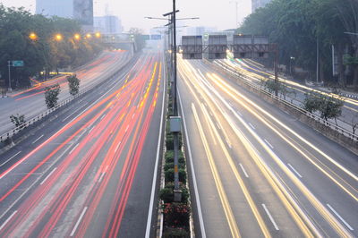 High angle view of light trails on road