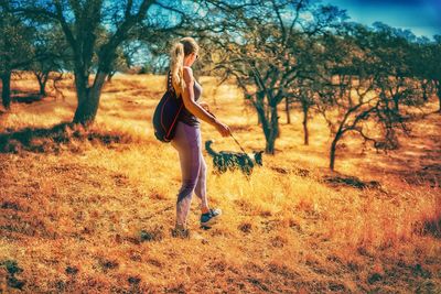 Full length of man on field