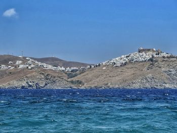 Scenic view of sea against clear blue sky