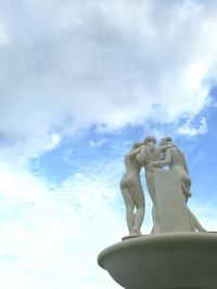 Low angle view of statue against sky