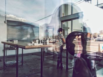 Modern office building in city seen through window