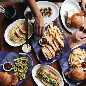 High angle view of man preparing food on table