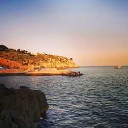 Scenic view of sea at sunset