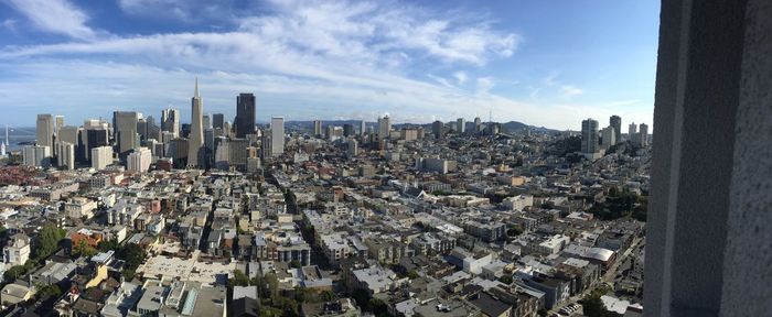 Panoramic view of cityscape against sky