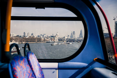 Close-up of sea seen through window