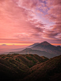 Scenic view of mountains against sky during sunset