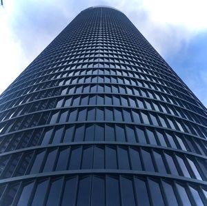 Low angle view of modern building against sky