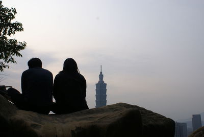 Silhouette of woman against sky