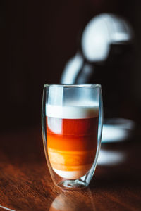 Close-up of beer glass on table