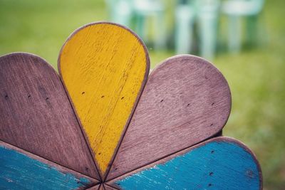 Close-up of heart shape decoration on wood