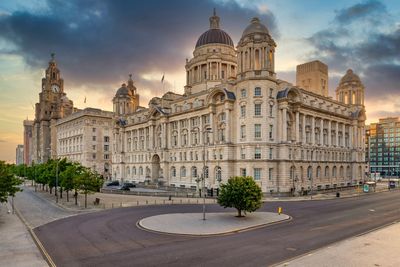 View of historic building in city against sky