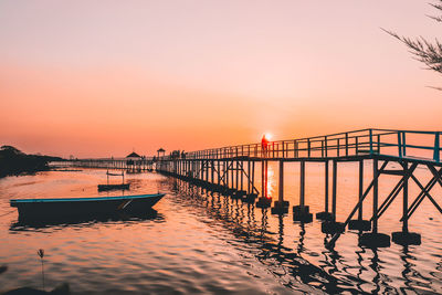 Scenic view of sea against clear sky during sunset