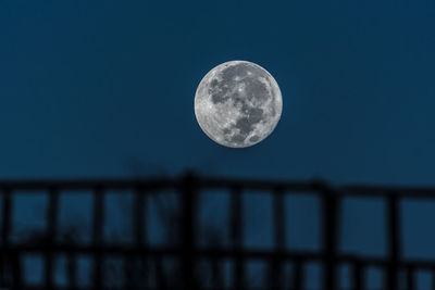 Low angle view of moon against sky at night