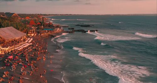 High angle view of beach against sky during sunset