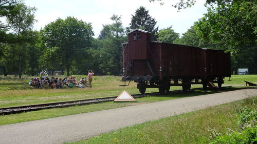 Train on railroad track against sky